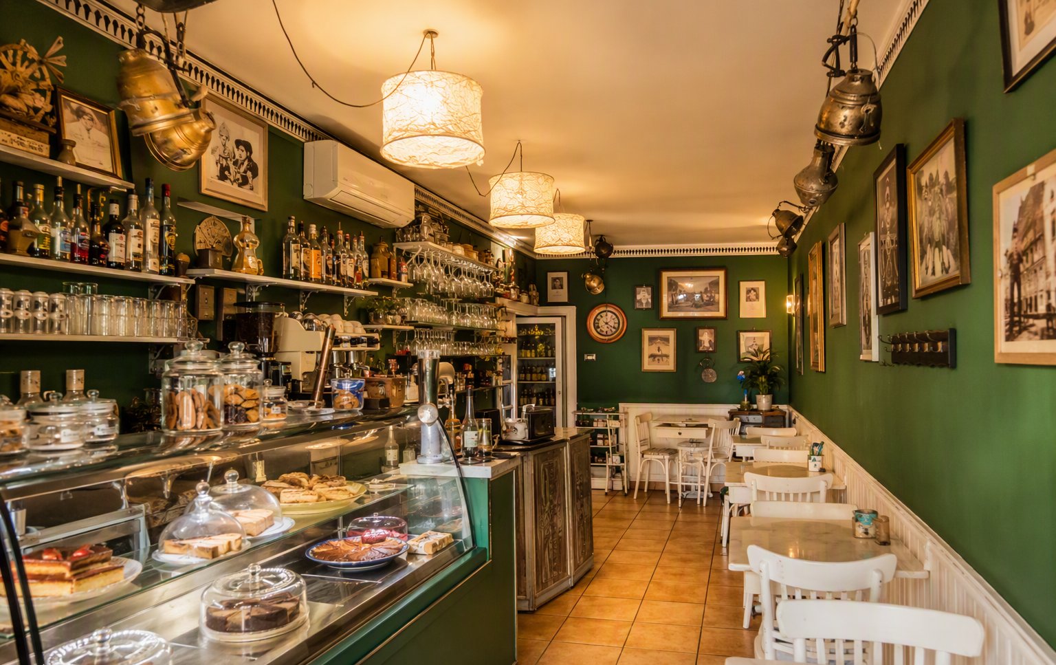 The cozy green interior of La Alacena de Padua
